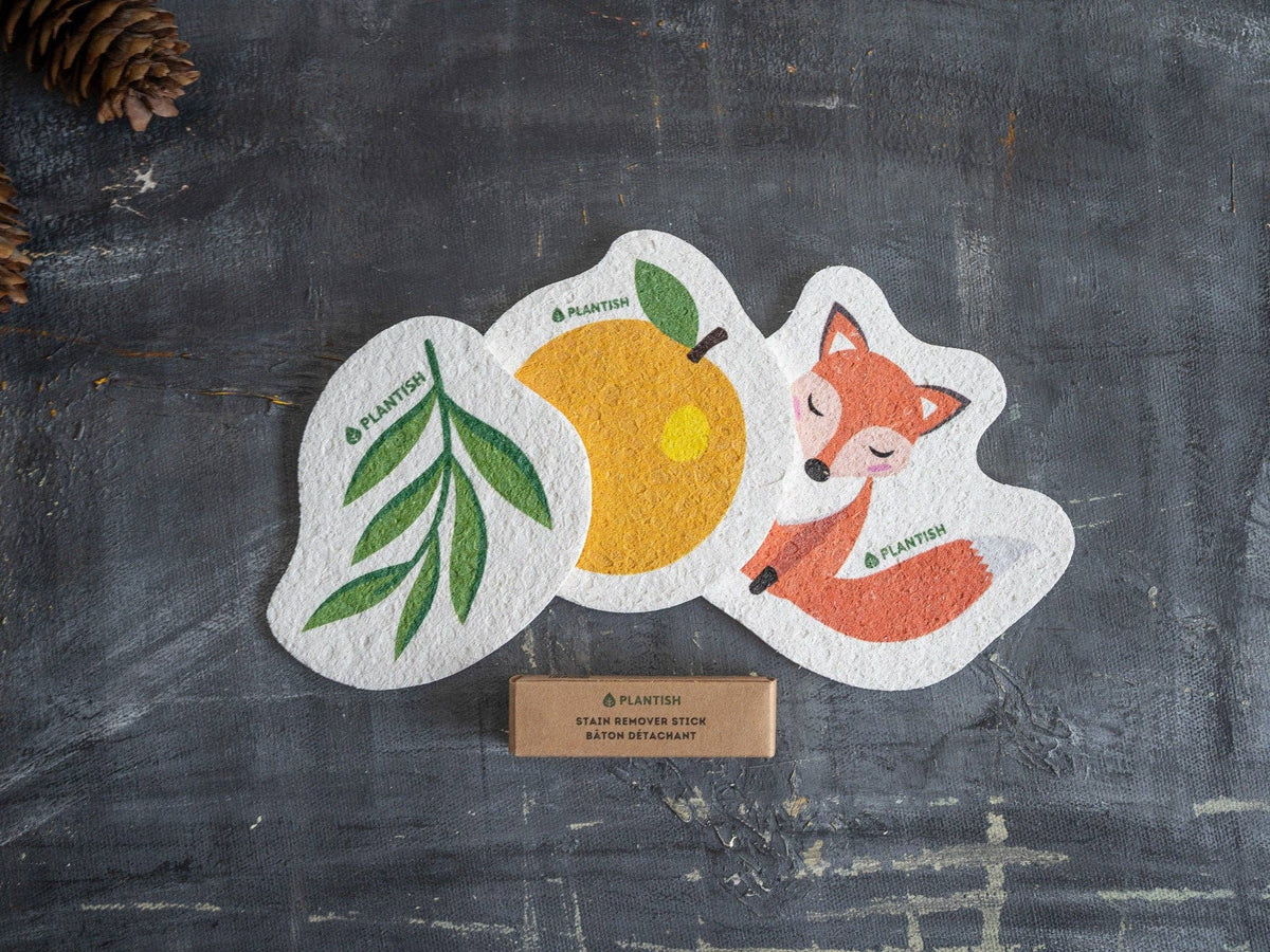 Plantish plastic-free compostable orange cellulose sponge, orange and leaf print cellulose sponges on slate