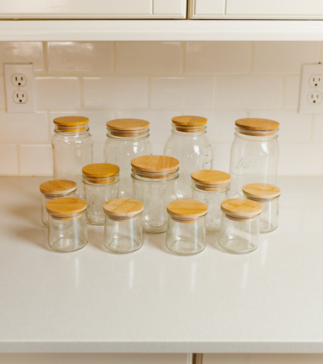 Bamboo Switch Oui Yogurt Jar Bamboo Lid - rows of lidded yogurt jars on shelf