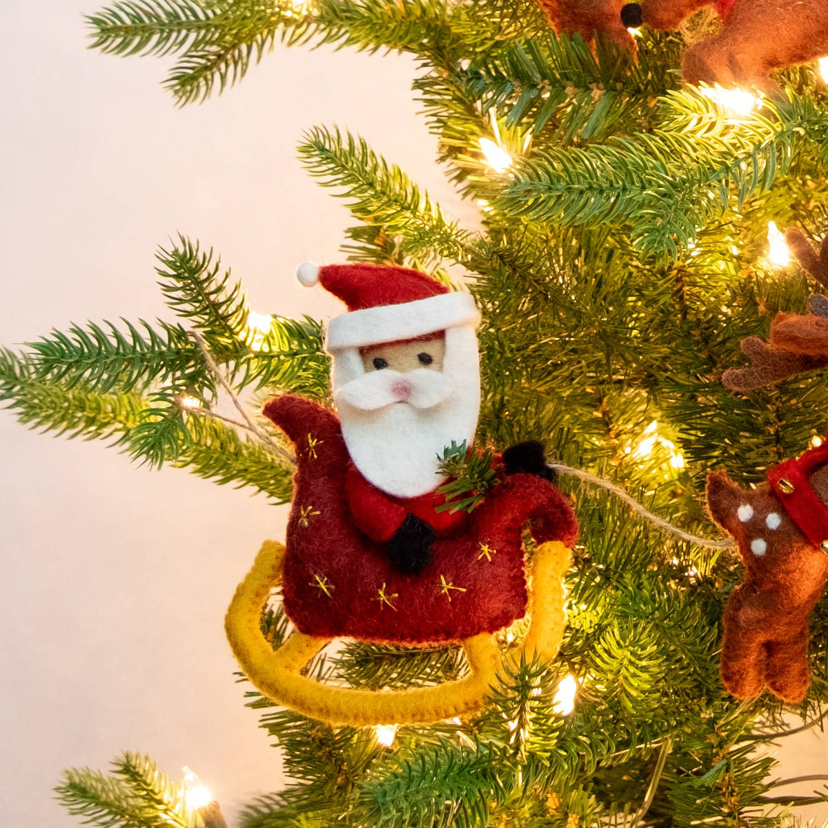 The Winding Road - Garland - Christmas - Santa Sleigh and 8 Reindeer - Brown — Santa felt ornament hanging on Christmas tree