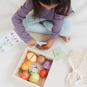 Pearhead Wooden Farmers Market 21-Piece Toy Set: wooden toy garbage truck on white; FSC-certified wood