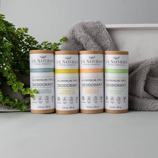 J&L Naturals Extra-Strength Deodorant (Full Size - several deodorant tubes on bathroom shelf; plant-based