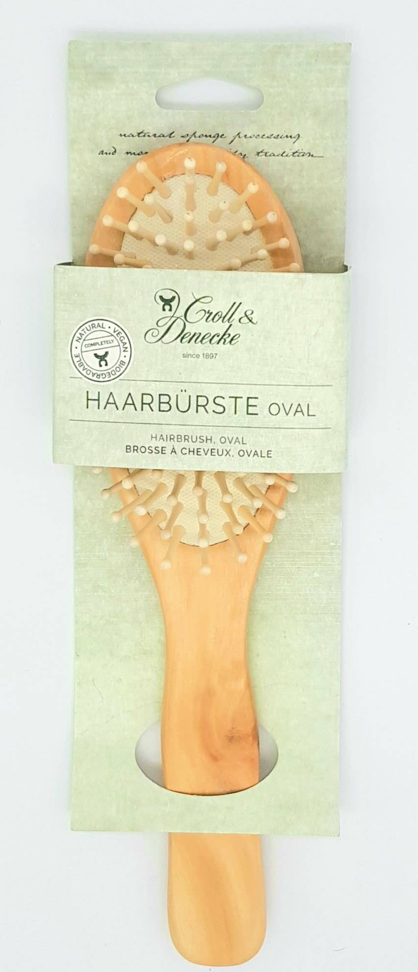 Croll & Denecke vegan birch wood paddle hairbrush, packaged vegan wood hairbrush with green label
