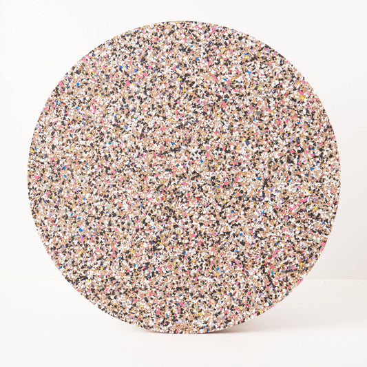 LIGA recycled EVA plastic and organic cork placemats: round speckled LIGA Beach Clean MAX placemat on white