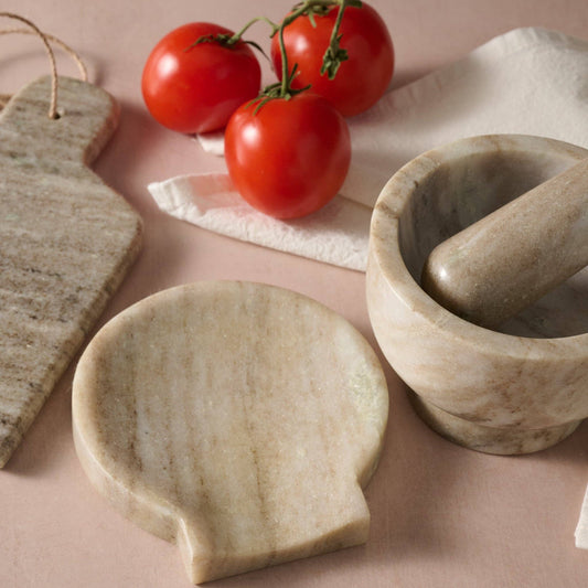 Ten Thousand Villages Morchana Marble Spoon Rest: spoon photographed against white