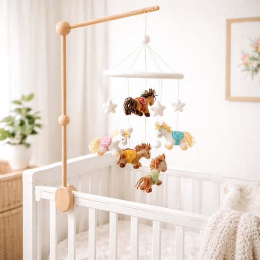 Ganapati Felt Baby Mobile - Cute Pony: felt pony figures hanging from nursery mobile; handcrafted wool-felt figures