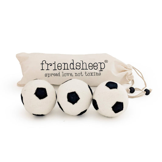 Friendsheep reusable wool dryer balls with soccer designs in a reusable fabric gift bag