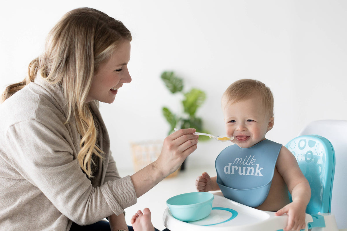 Pearhead Baby Bib Set, Milk Drunk, Silicone, Set of 2: outfit details and neckline