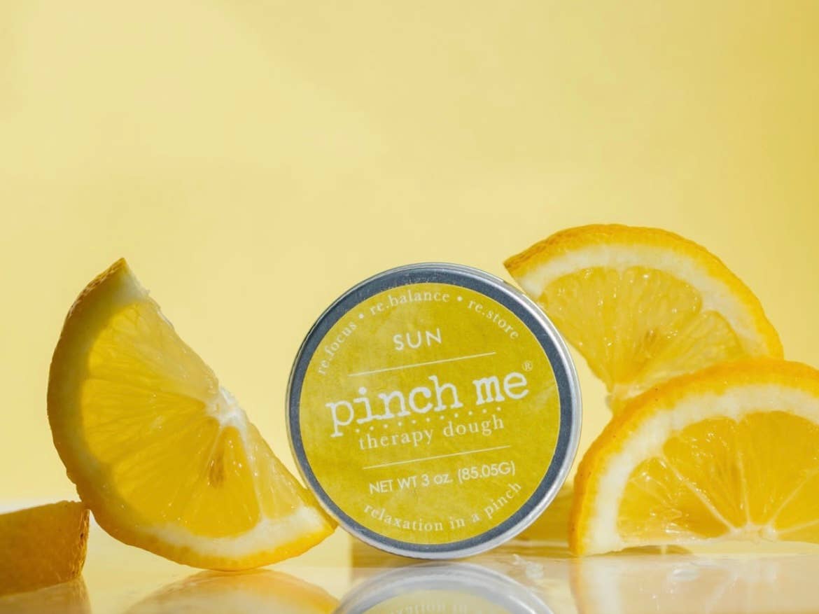 Pinch Me Therapy Dough – Sun, arranged with surrounding accessories