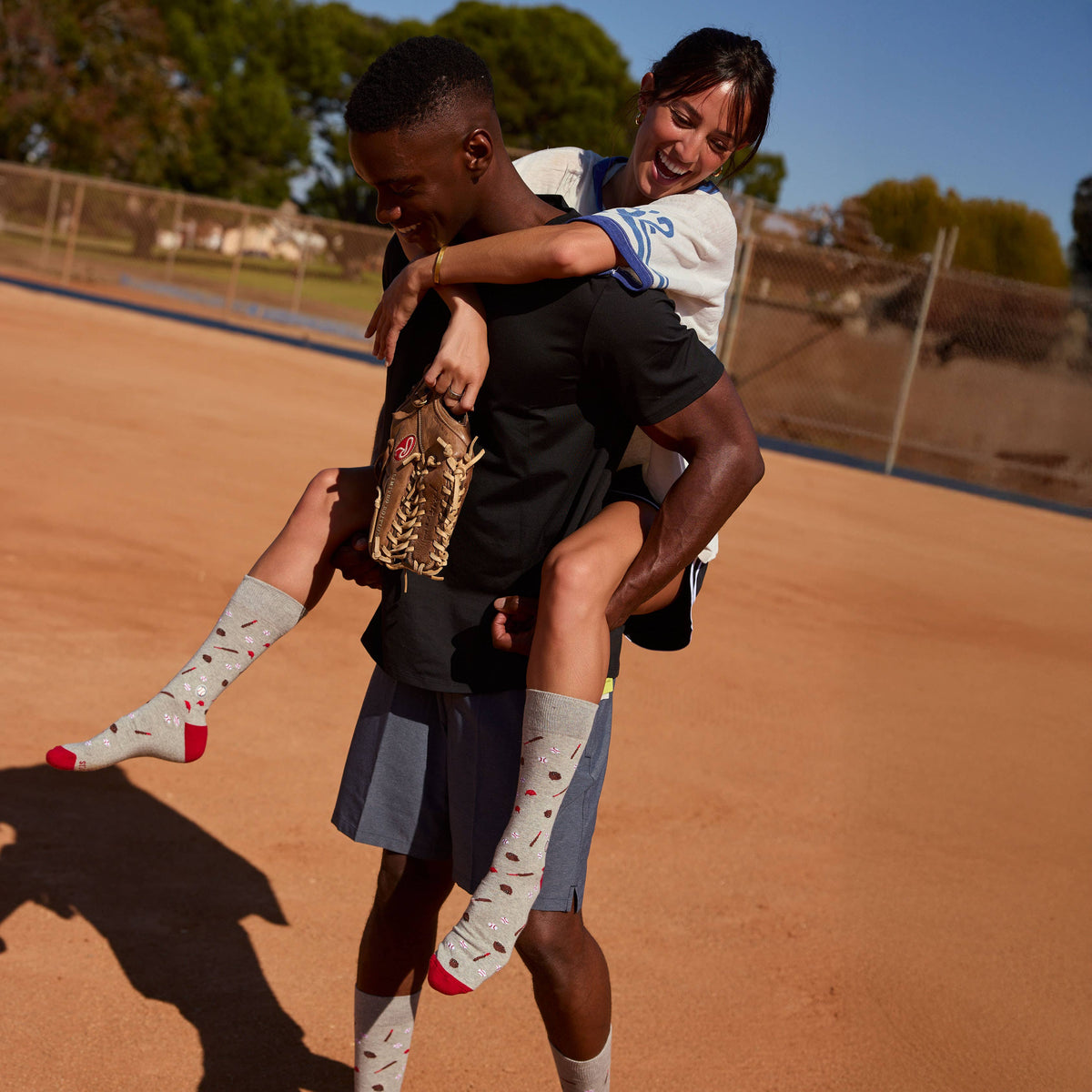 Socks that Support Youth Sports | Gray Baseballs