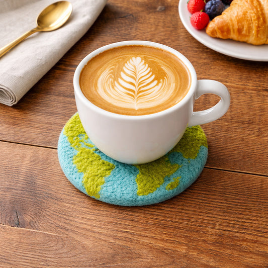 Ganapati organic wool Earth felt drink coasters, organic wool Earth-shaped felt coaster beneath cappuccino