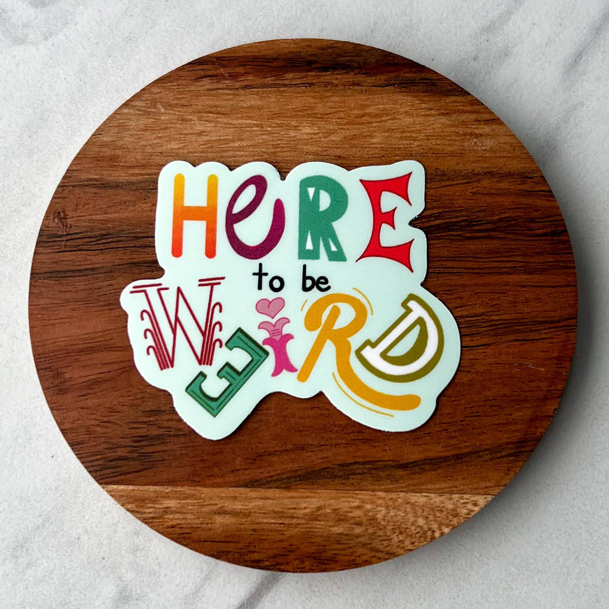 Here to be weird sticker