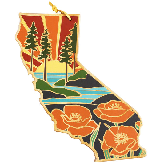 Totally Bamboo California Cutting Board with Artwork by Summer Stokes: cutting board photographed against; bamboo wood grain