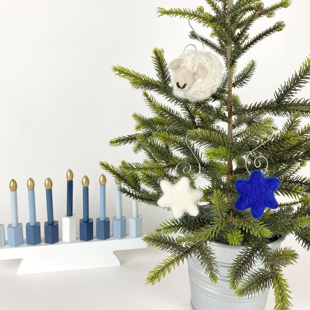 Sheep Farm Felt Ornament Gift Set Happy Hanukkah - blue felt Star of David ornament hung on evergreen tree