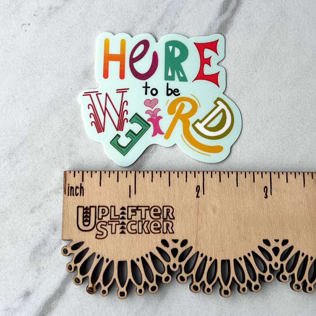 Here to be weird sticker