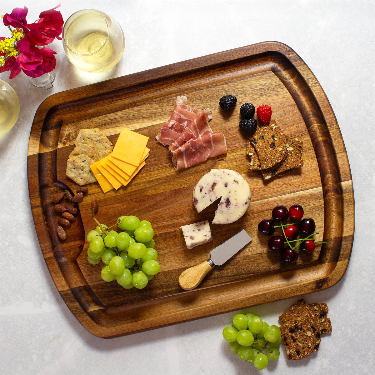 Totally Bamboo Rock & Branch® Acacia Wood Carving Board with Juice Groove: close view of surface and edge details