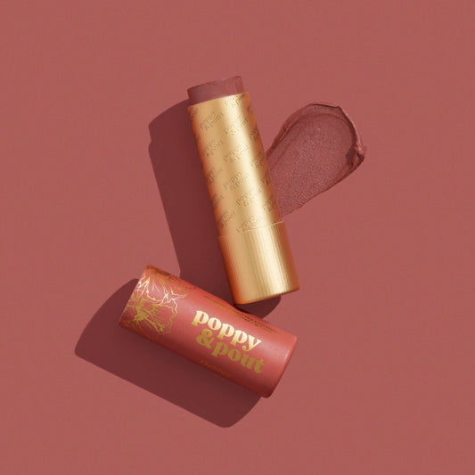 Poppy & Pout Debbie peach tinted lip balm, cruelty-free tinted balm in gold tube with peach color swatch