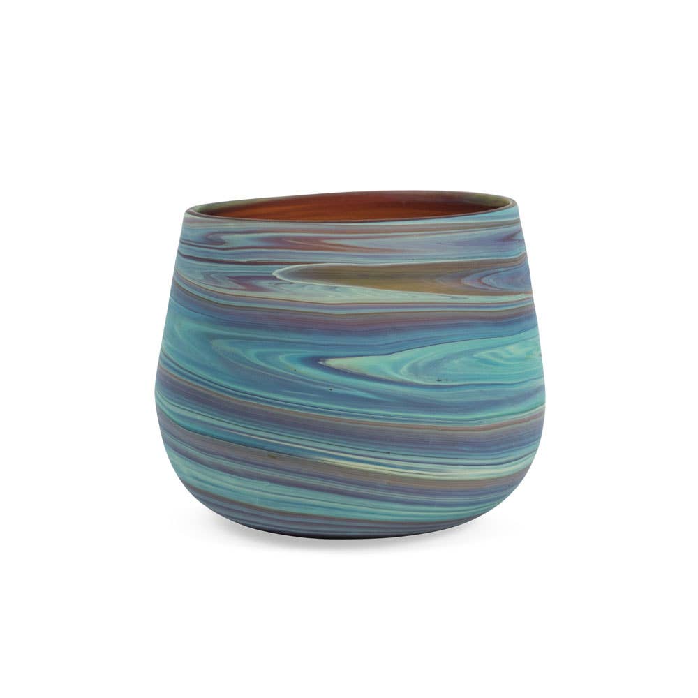 Ten Thousand Villages Phoenician Glass Candleholder: kitchen item photographed against white; recycled glass
