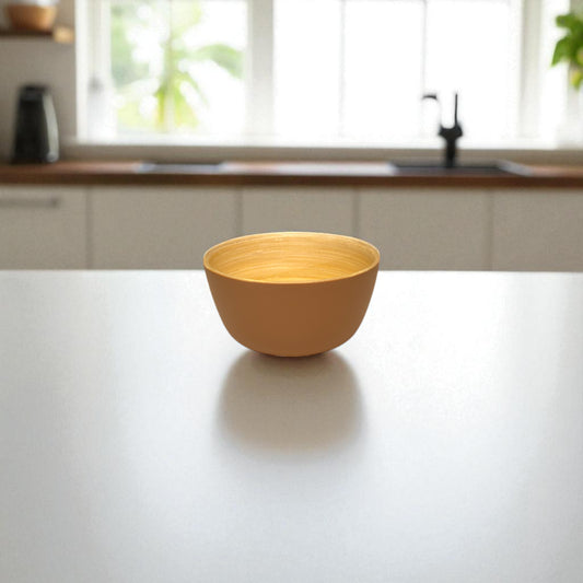 albert L. (punkt) Matte Bamboo Mini Bowl - yellow matte bamboo mini bowl on kitchen counter; natural bamboo