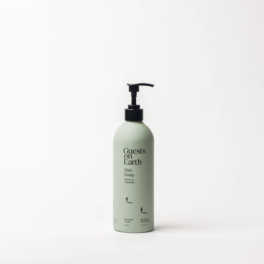 Guests on Earth Citrus Oasis refillable dish soap pump bottle: Guests on Earth seafoam dish soap pump bottle on white