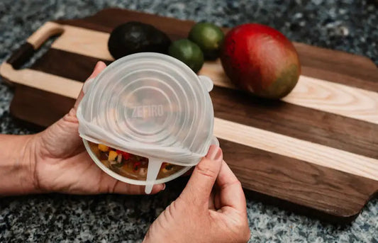 Zefiro Silicone Lids - clear stretch silicone lid pulled over glass bowl; reusable