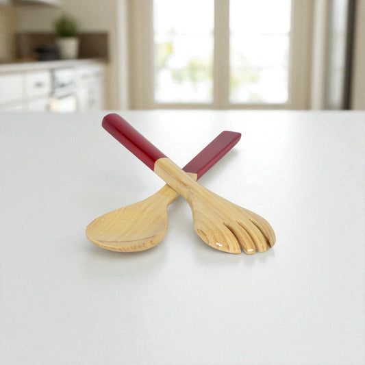 albert L. (punkt) Small Bamboo Server Set - small bamboo servers with burgundy grips on counter