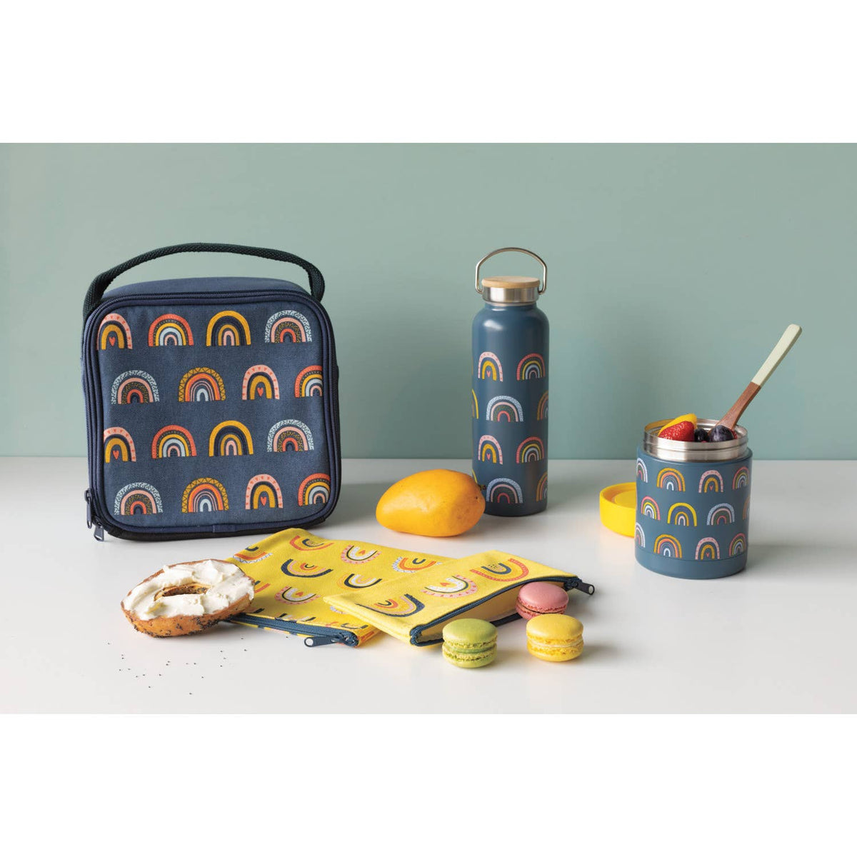Danica Jubilee reusable rainbow-print snack bags — two snack bags beside lunch snacks on table