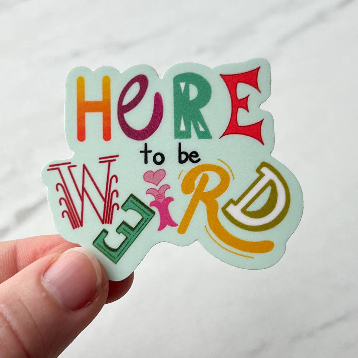 Here to be weird sticker