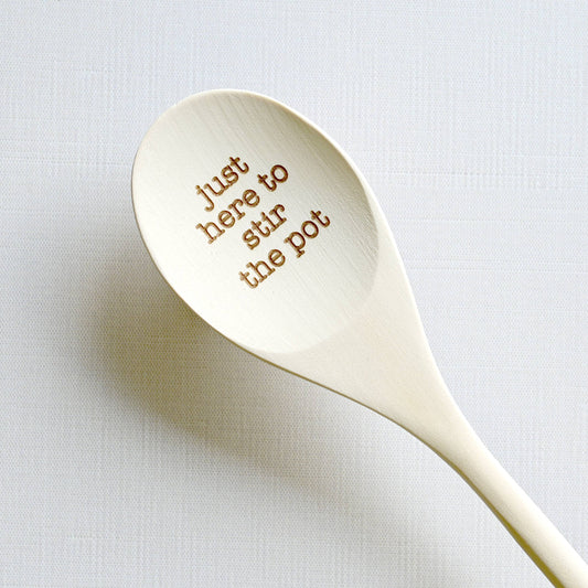 Blue Studio Creative Just Here to Stir the Pot engraved wooden spoon — close-up of engraved lettering on wooden spoon