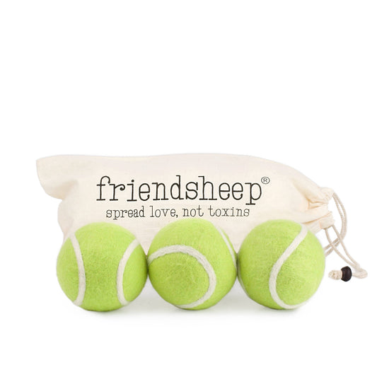 Friendsheep Tennis Eco Wool Dryer Balls - GRAND SLAM - three green tennis-ball-look wool dryer balls and drawstring bag