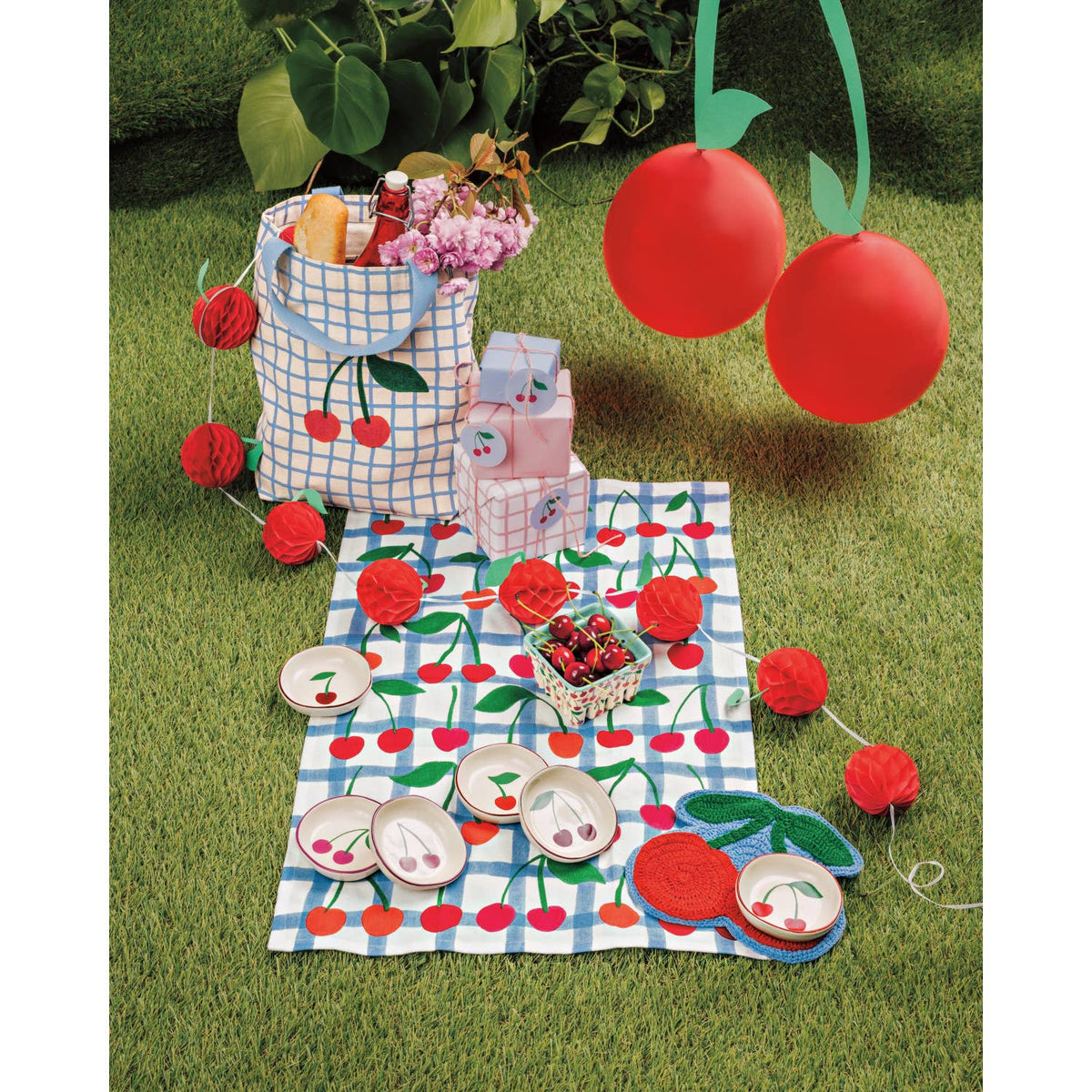 Danica Jubilee stoneware Very Cherry berry basket — colorful cherry-pattern berry basket in picnic display