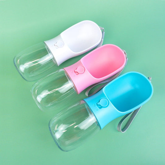 Green Waves Co. reusable dog travel water bottle, three clear bottles with pink blue and white bowls