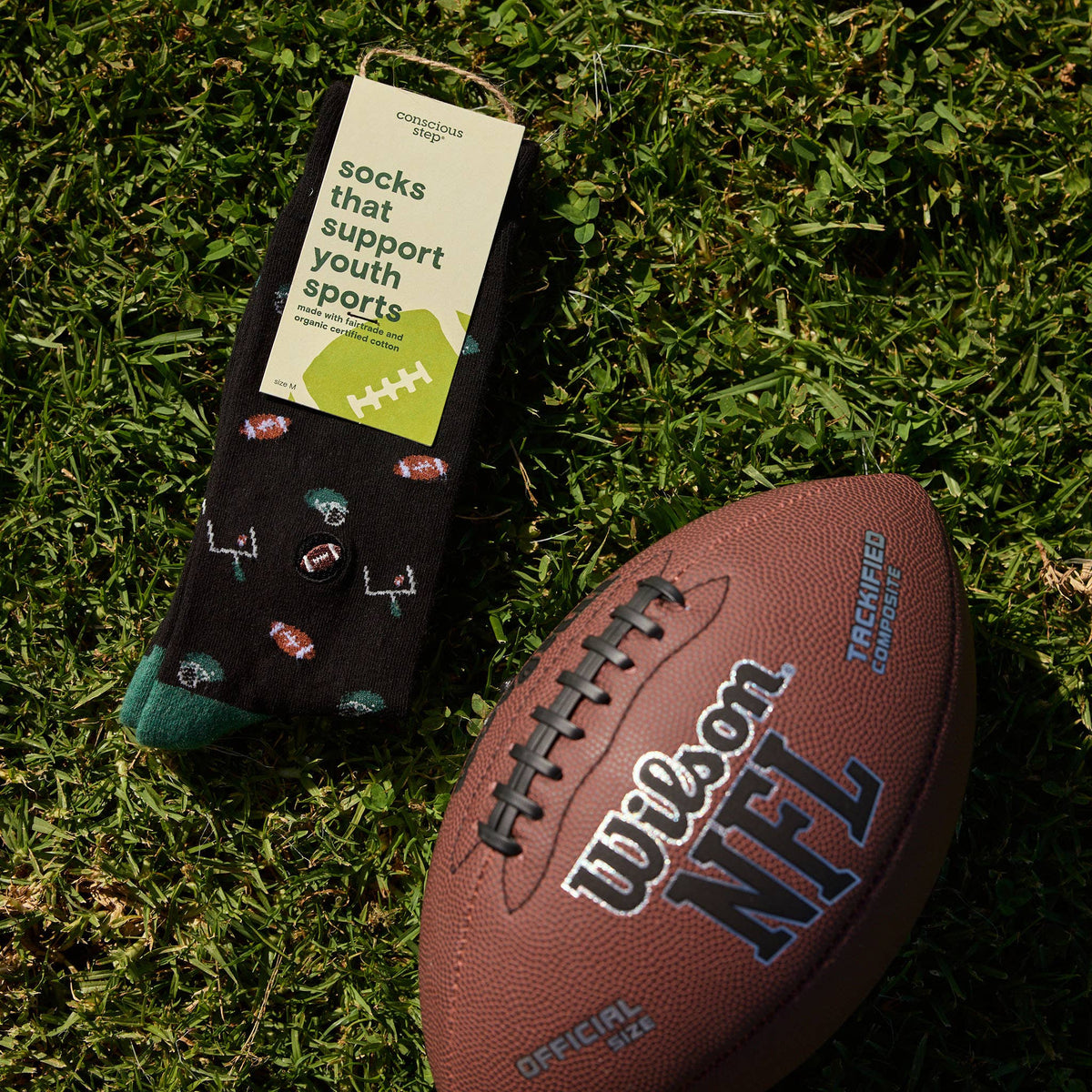 Socks that Support Youth Sports | Black Footballs