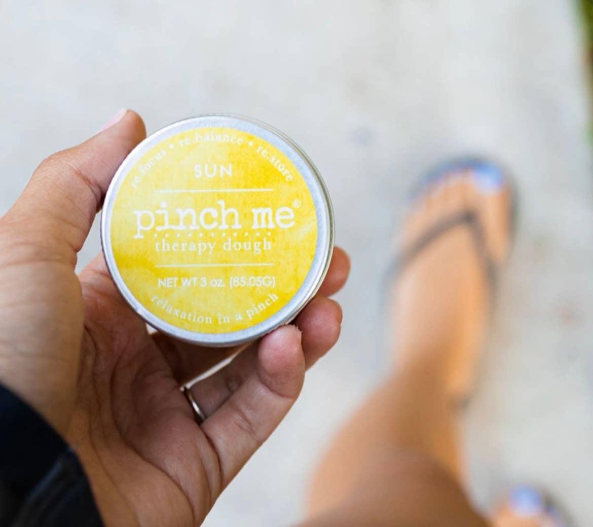 Pinch Me Therapy Dough – Sun, person displaying the item