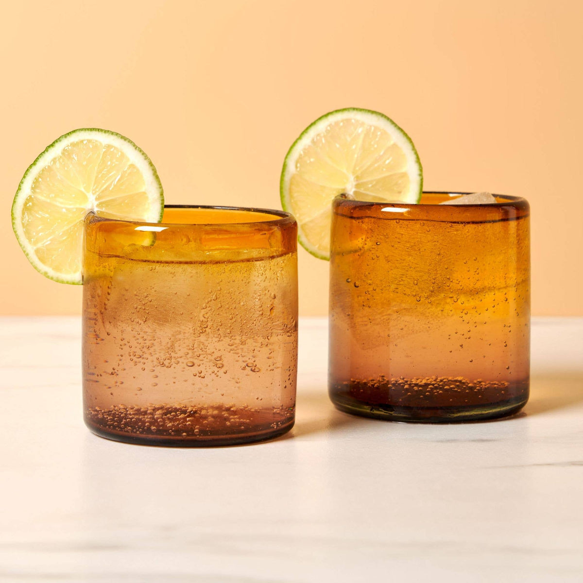 Twine – Segunda Vida El Ocaso Recycled Tumblers Set of 2, styled in a lifestyle setting; recycled glass
