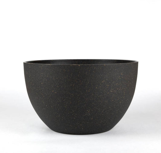 Loopy Products Bamboo Reusable Small Serving Bowl w/o Lid: serving bowl photographed against; upcycled agri-waste material