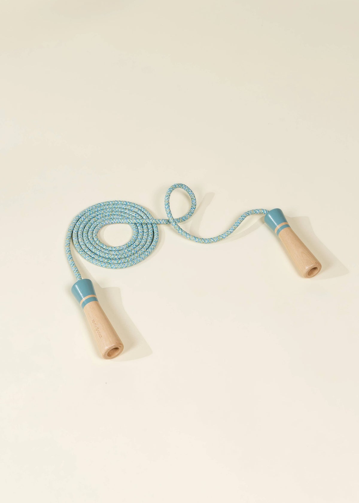 Coco Village blue rope with wooden jump handles, turquoise extra-long jump rope coiled with two pale wooden grips