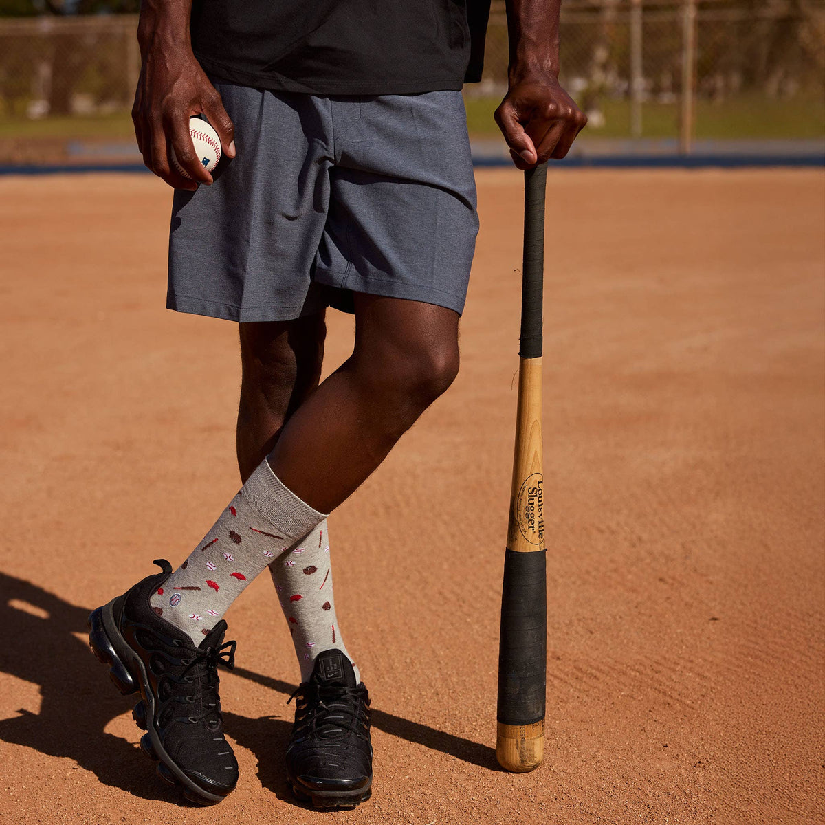 Socks that Support Youth Sports | Gray Baseballs
